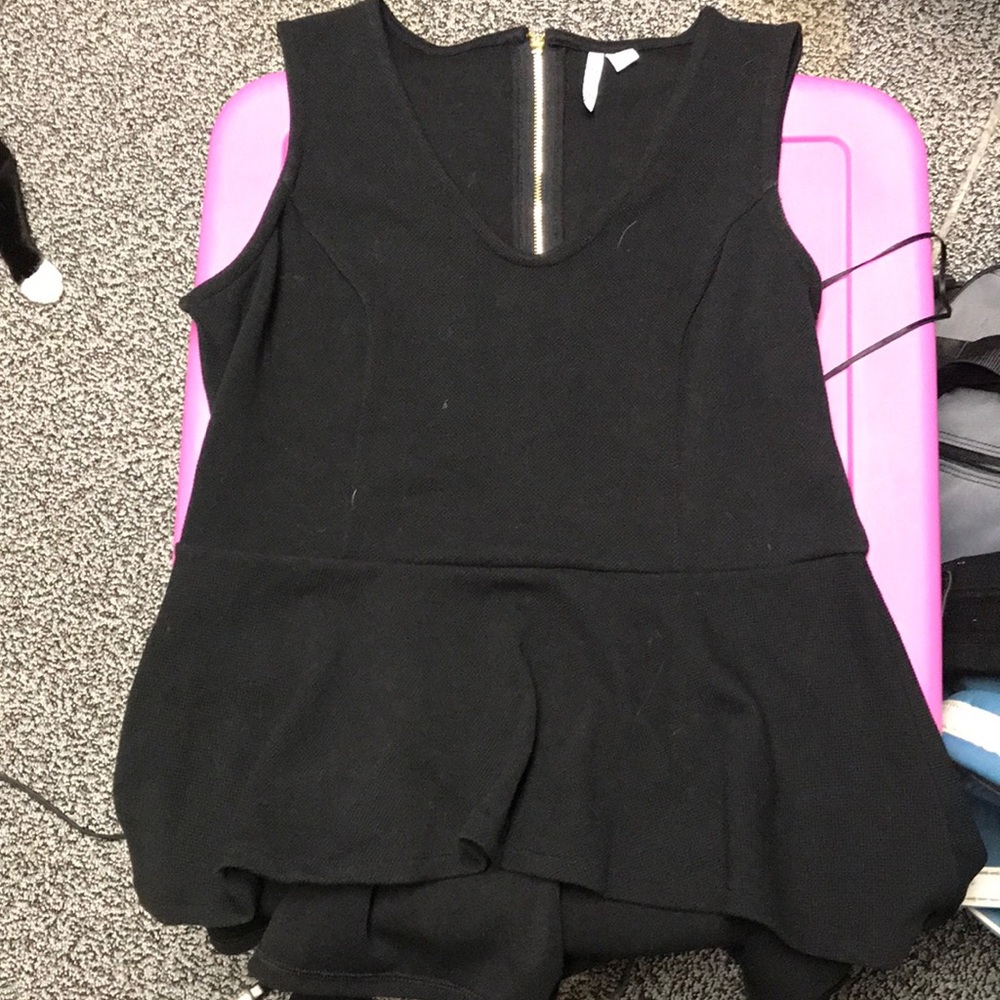 Elle high low peplum shirt. Size medium.